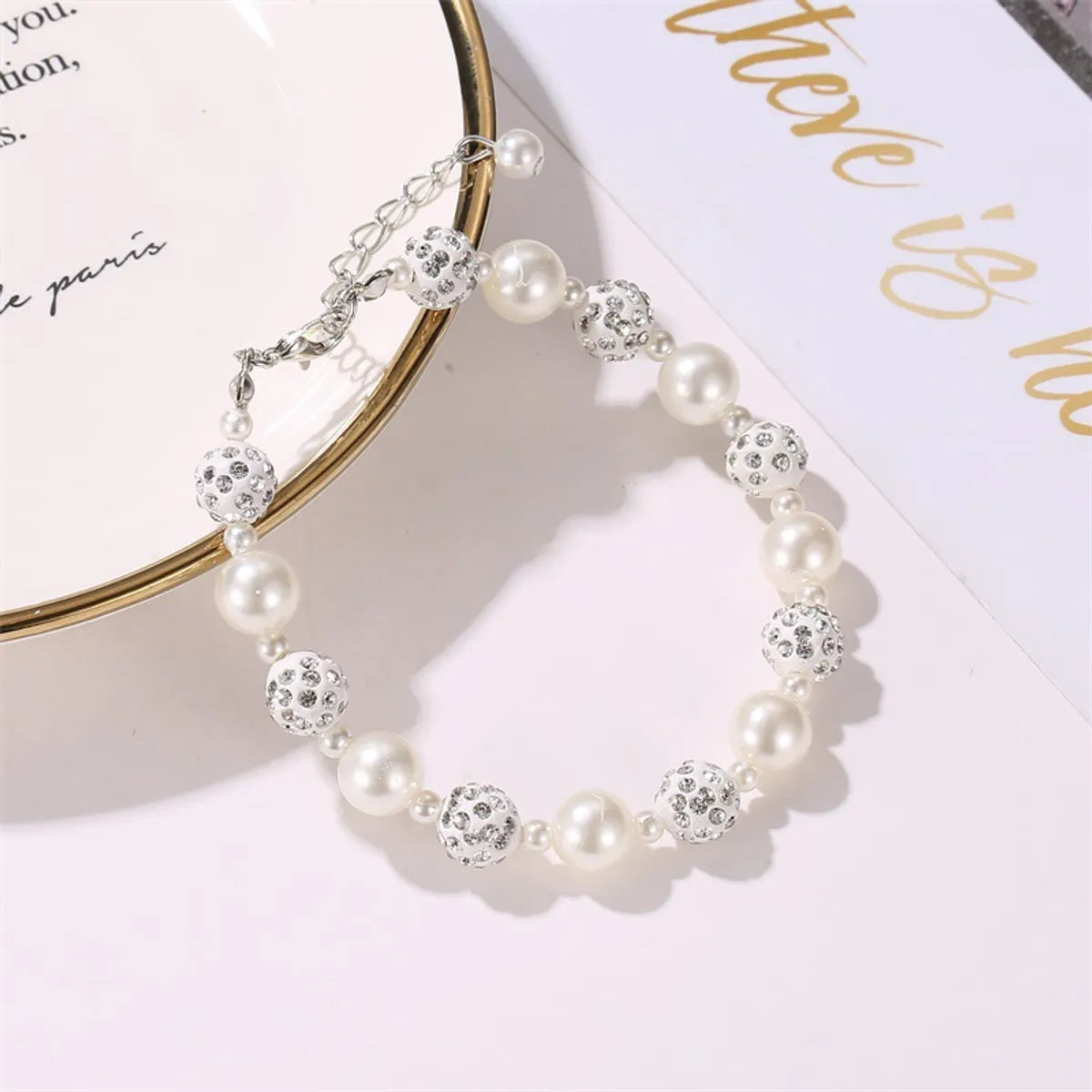 women's sapphire bracelets-Casual Simple Style Round Imitation Pearl Resin Plating Inlay Rhinestones Women'S Bracelets