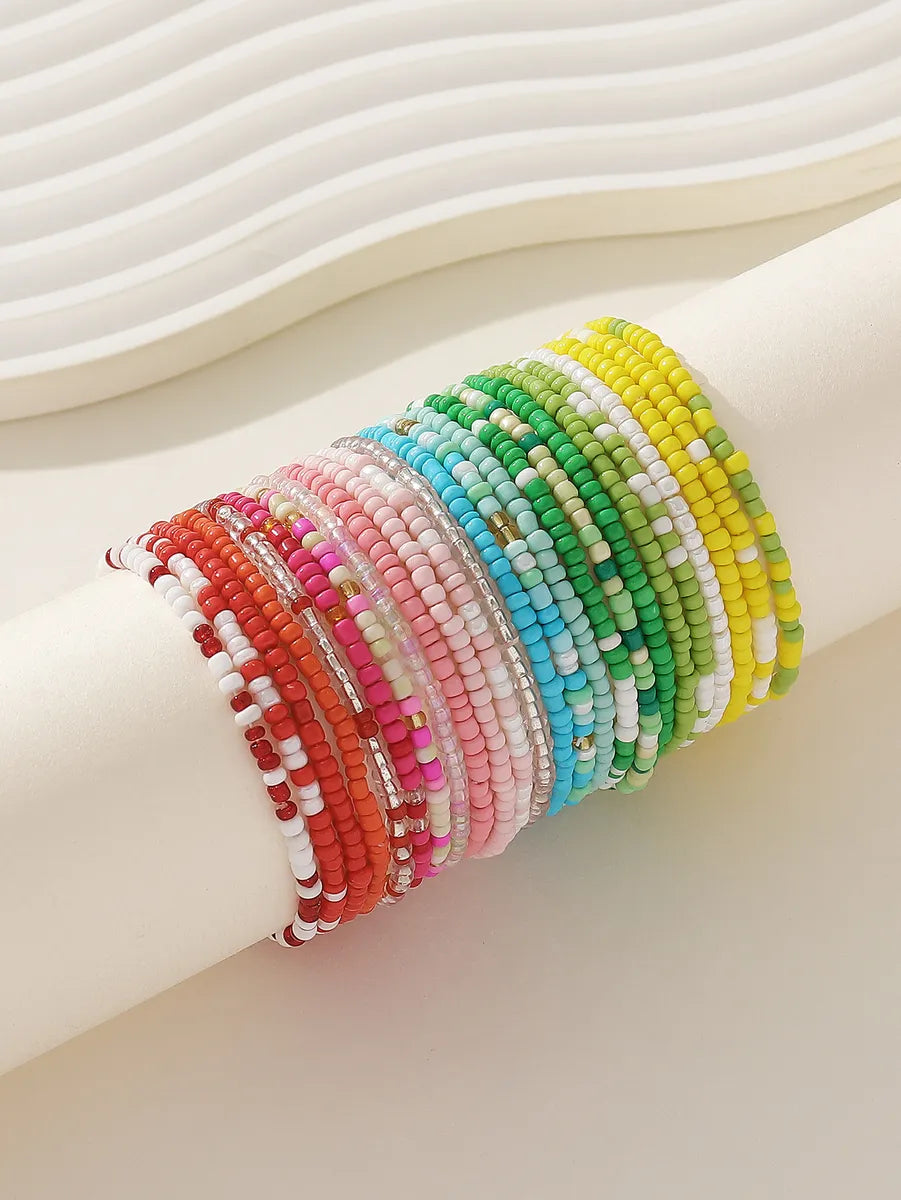 women's white gold bracelets-Bohemian Sweet Colorful Synthetic Resin Beaded Women'S Bracelets