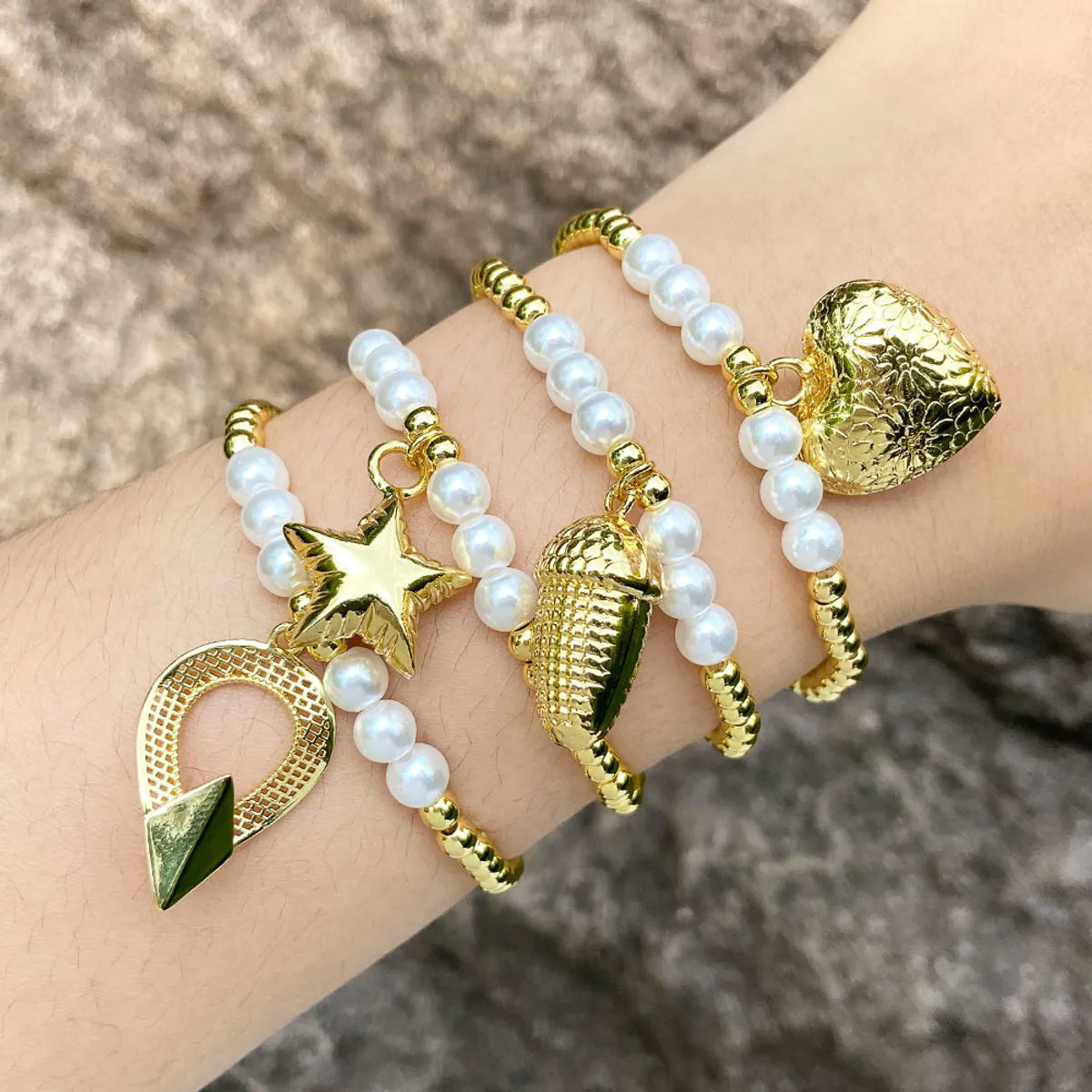 women's moonstone bracelets-Modern Style Simple Style Pentagram Heart Shape 18K Gold Plated Artificial Pearl Copper Wholesale Bracelets