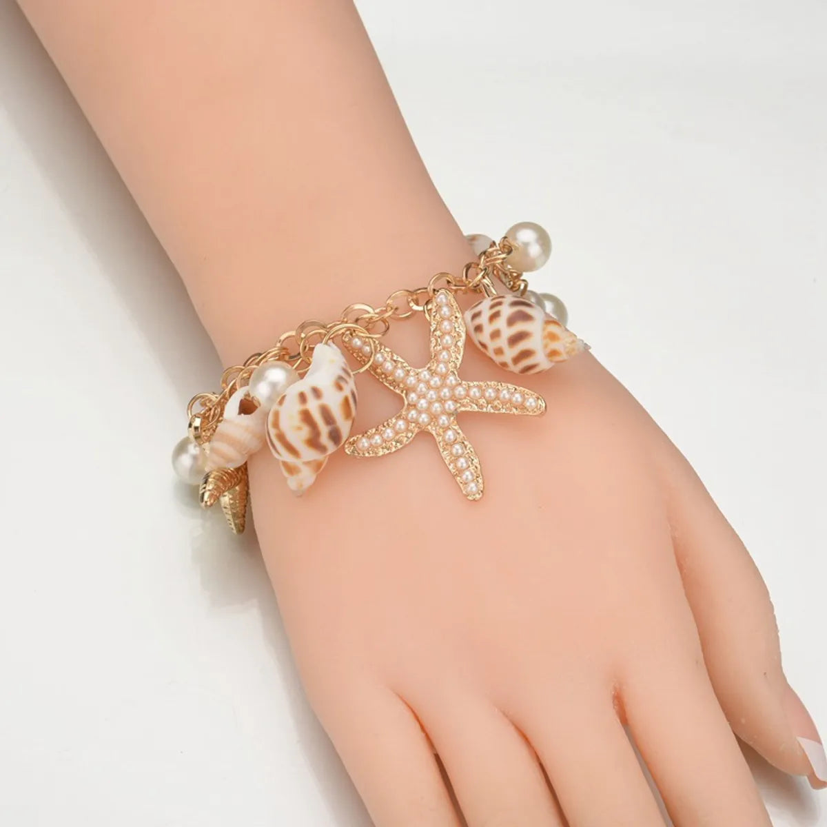 women's nature-inspired bracelets-Casual Ethnic Style Starfish Shell Pearl Shell Zinc Alloy Wholesale Bracelets