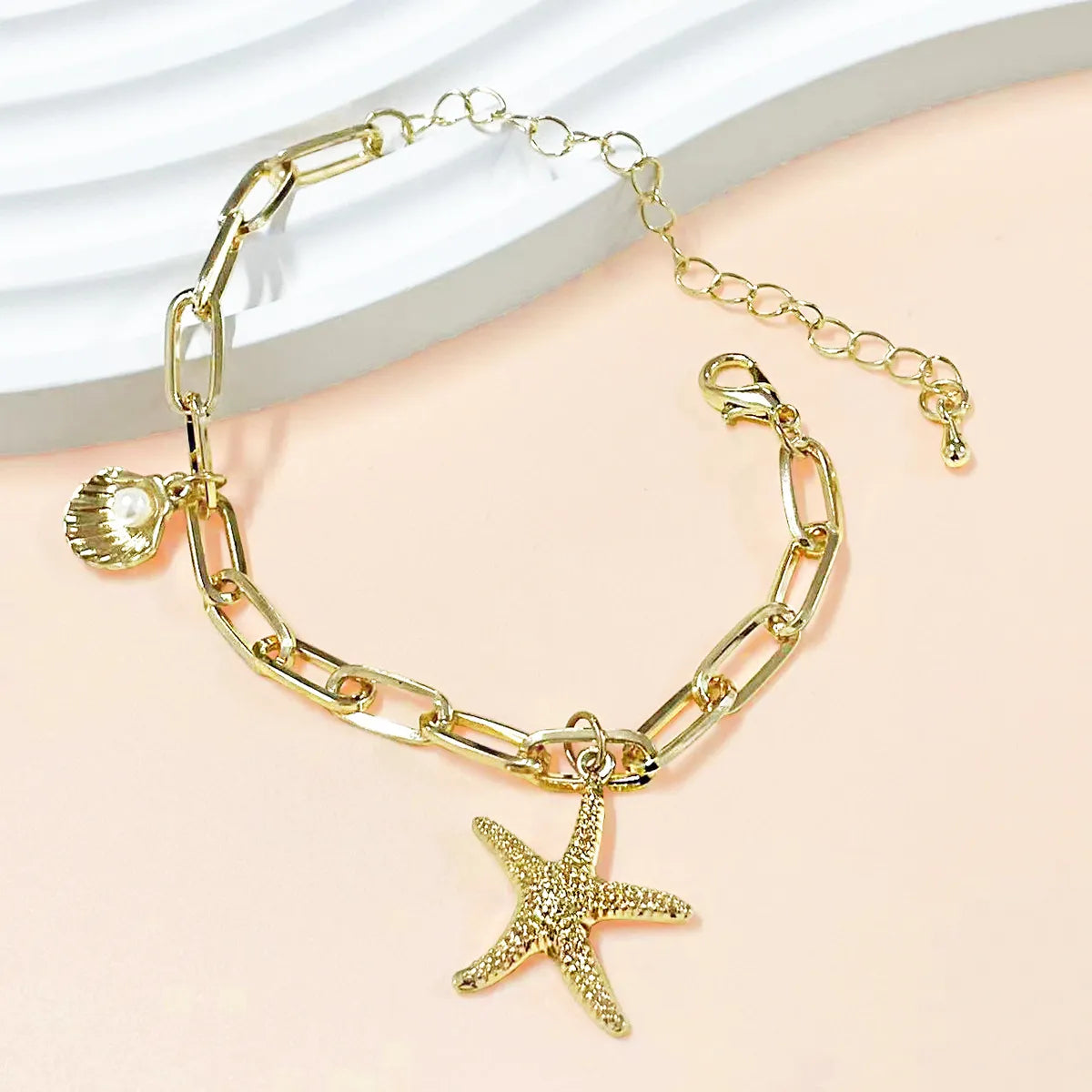 women's stackable bangles-Casual Simple Style Starfish Shell Artificial Pearls Alloy Wholesale