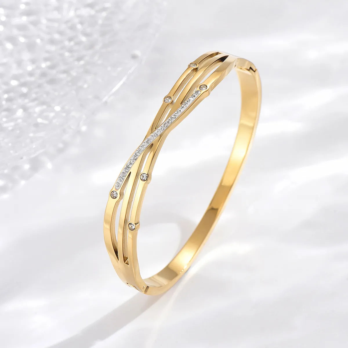 women's platinum bangles-Elegant Simple Style Irregular Twist Stainless Steel Asymmetrical Plating Hollow Out Zircon 14k Gold Plated Bangle