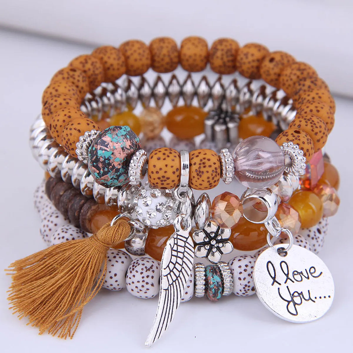 women's trendy bangles-Fashion Disc Heart Wings Tassels Beads Multi-Layered Bracelet Wholesale